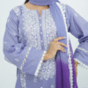 A model wearing Amzoclothing’s Cerulean Blue 3-piece embroidered lawn suit with white threadwork and ombre chiffon dupatta – Eid and summer festive wear 2025.