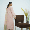 Model wearing rose pink embroidered cotton dress with cutwork neckline, organza sleeves, and heavy dupatta by Amzoclothing