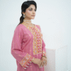 Model in pink embroidered lawn Eid dress with pearl details, white sharara pants, and printed net dupatta – Amzoclothing Eid 2025.