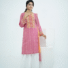Model in pink embroidered lawn Eid dress with pearl details, white sharara pants, and printed net dupatta – Amzoclothing Eid 2025.