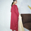 A model wearing a gold sequin embroidered festive shirt with masuri gold dupatta featuring traditional tassel hangings – Eid/wedding outfit by Amzoclothing.