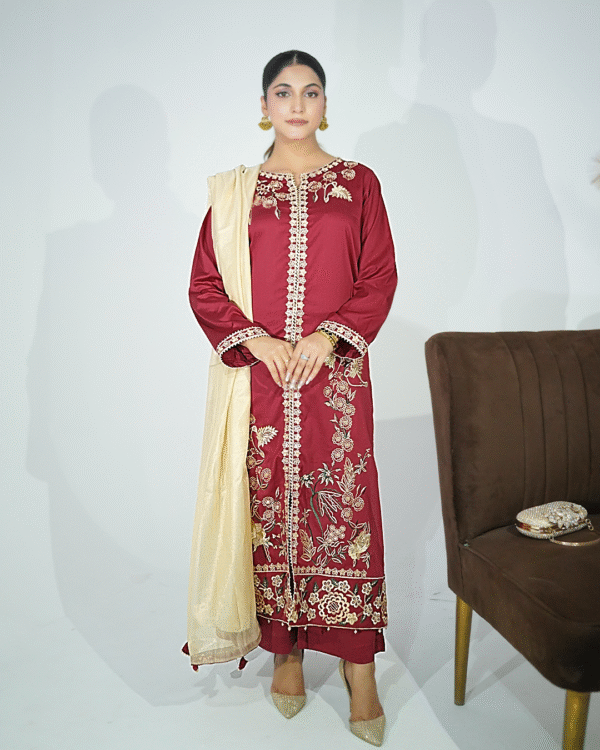 A model wearing a gold sequin embroidered festive shirt with masuri gold dupatta featuring traditional tassel hangings – Eid/wedding outfit by Amzoclothing.